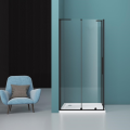 Kabina prysznicowa KOLORADO Veldman z czarnymi profilami, w rogu minimalistycznej łazienki, obok fotel z poduszką.png