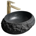 Kamienna czarna okrągła umywalka nablatowa ALENA Veldman z złotą szczotkowaną baterią