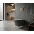 Nowoczesna łazienka z wiszącą misą wc Imperia na tle surowej, kamiennej ściany w ciemnych odcieniach - widok od boku
