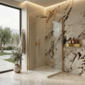 Nowoczesna kabina prysznicowa SEVIA DUO ze złożonymi drzwiami z marmurową ścianą, złotymi elementami i dużym oknem, przez które widać ogród z drzewami..png