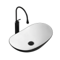 Umywalka ZUZAN designerska, owalny kształt, kontrast czerni i bieli elegancja