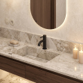 Bateria umywalkowa COSTA w kolorze czarny mat na marmurowym blacie z umywalką zintegrowaną.